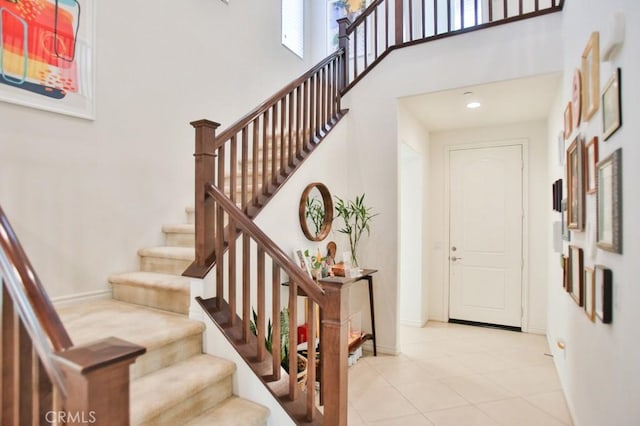 233 47th St, Long Beach, CA 90805 - entrance foyer with a high ceiling, stairway, light tile patterned floors, and recessed lighting