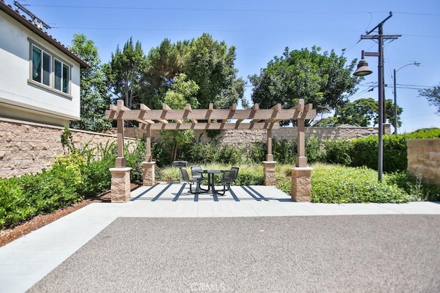 233 47th St, Long Beach, CA 90805 - view of patio featuring a pergola and outdoor dining space