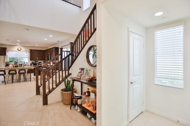 233 47th St, Long Beach, CA 90805 - stairway with tile patterned flooring and recessed lighting