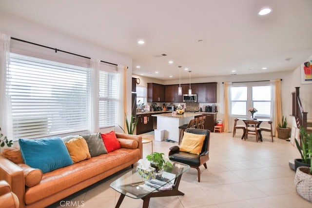 233 47th St, Long Beach, CA 90805 - living room with recessed lighting and light tile patterned flooring