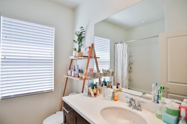 233 47th St, Long Beach, CA 90805 - bathroom with vanity, healthy amount of natural light, and curtained shower