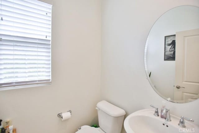 233 47th St, Long Beach, CA 90805 - half bathroom featuring a sink and toilet