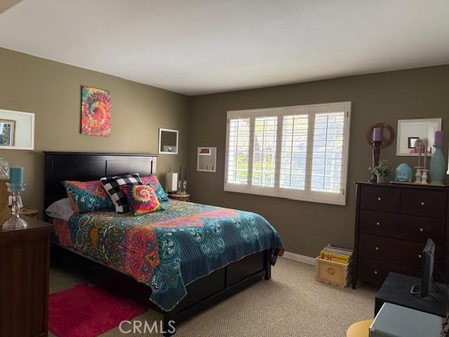 3211 Sello Ln Unit 100, Carlsbad, CA 92009 - bedroom with carpet floors and baseboards