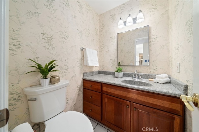 11265 Gardiners Ct, Cypress, CA 90630 - half bathroom featuring vanity and tile patterned floors