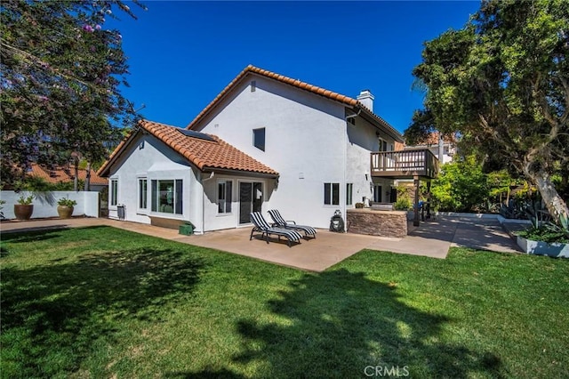 1205 Cerca, San Clemente, CA 92673 - back of property featuring a chimney, a patio, a balcony, stucco siding, and a tile roof