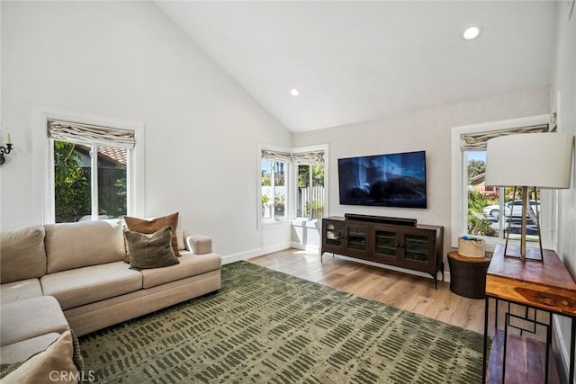 1205 Cerca, San Clemente, CA 92673 - living area with wood finished floors, high vaulted ceiling, and recessed lighting