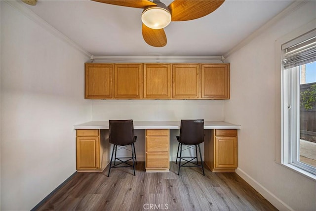 1205 Cerca, San Clemente, CA 92673 - office space with built in desk, crown molding, dark wood-type flooring, and ceiling fan