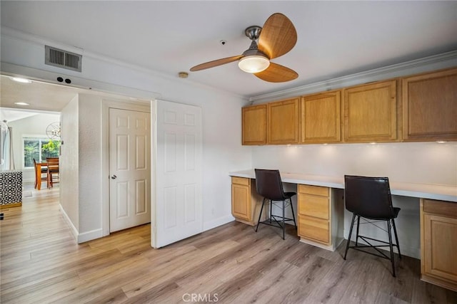1205 Cerca, San Clemente, CA 92673 - office space with built in desk, light wood-style floors, ornamental molding, and ceiling fan
