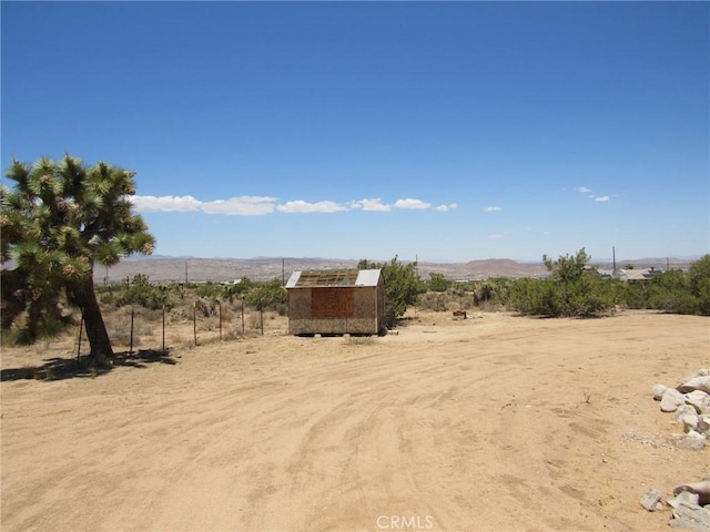 8626 La Contenta Rd, Yucca Valley, CA 92284 - view of yard featuring a view of countryside, a mountain view, and view of desert landscape