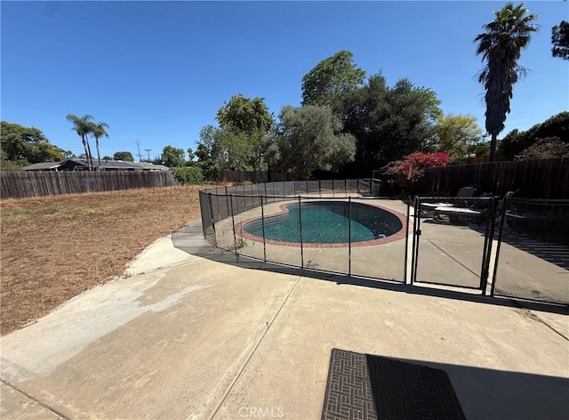 958 Berkshire Ct, Escondido, CA 92025 - view of swimming pool with a fenced backyard and a patio area