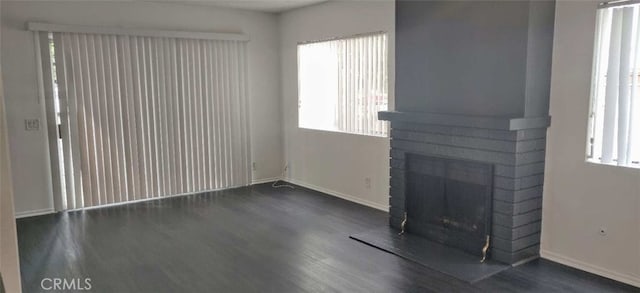 5236 Kester Ave Unit 6, Sherman Oaks, CA 91411 - unfurnished living room with wood finished floors and a fireplace