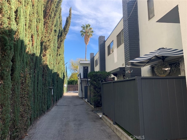 5236 Kester Ave Unit 6, Sherman Oaks, CA 91411 - view of property exterior featuring stucco siding and a chimney