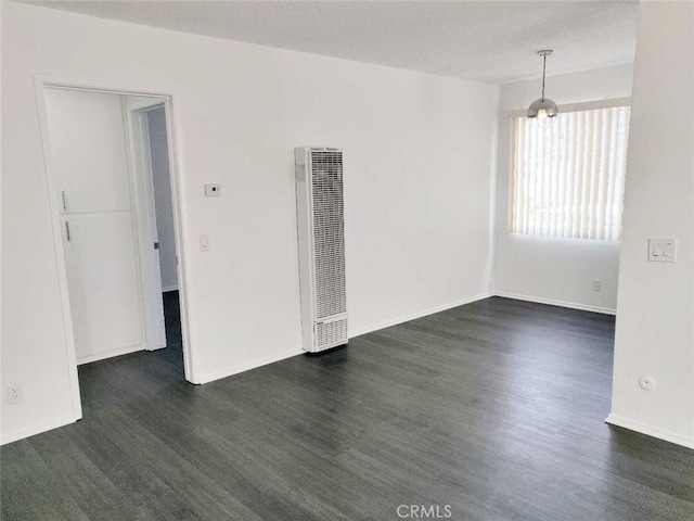 5236 Kester Ave Unit 6, Sherman Oaks, CA 91411 - spare room with a heating unit and wood finished floors