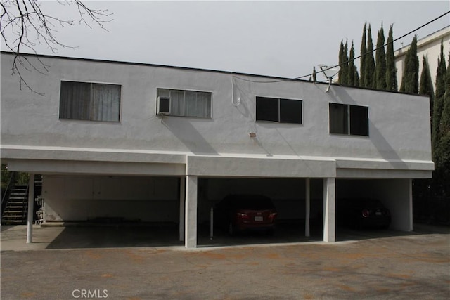 5236 Kester Ave Unit 6, Sherman Oaks, CA 91411 - back of house featuring stairway and stucco siding