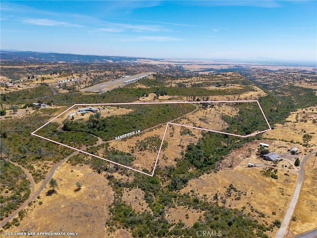 4620 Sandpiper Ln, Paradise, CA 95969 - aerial view of sparsely populated area with property boundaries highlighted and a desert landscape