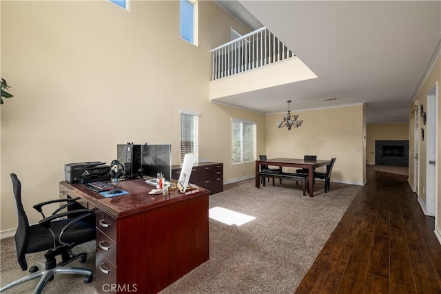 1649 Wrentree Way, Hemet, CA 92545 - office area with a chandelier, a fireplace, dark wood-type flooring, and crown molding