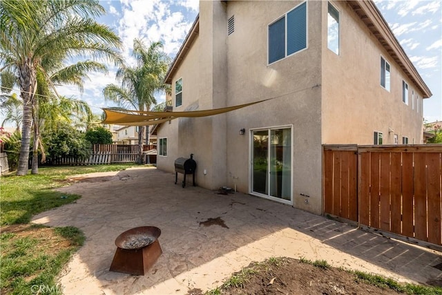1649 Wrentree Way, Hemet, CA 92545 - back of property with stucco siding, a patio, and a fenced backyard