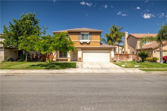 1649 Wrentree Way, Hemet, CA 92545 - view of front facade featuring stucco siding, driveway, and an attached garage