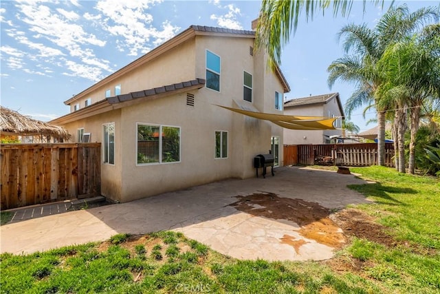 1649 Wrentree Way, Hemet, CA 92545 - rear view of house with stucco siding and a patio area