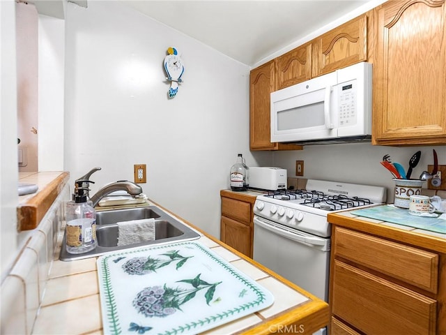515 N Shelton St, Burbank, CA 91506 - kitchen featuring white appliances, tile counters, brown cabinetry, and vaulted ceiling