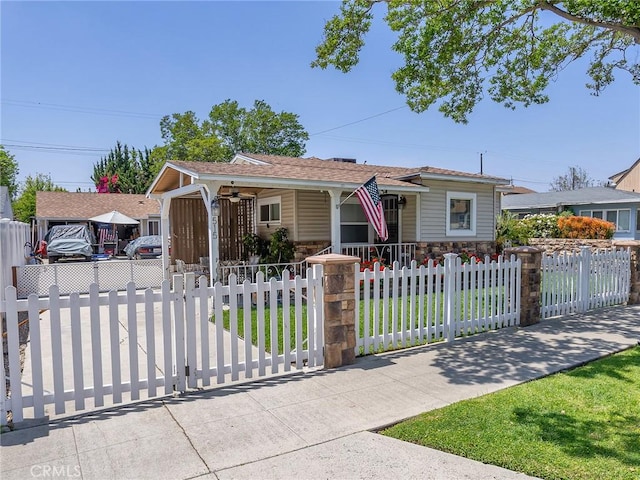 515 N Shelton St, Burbank, CA 91506 - view of front of home featuring a porch, concrete driveway, a fenced front yard, and a ceiling fan