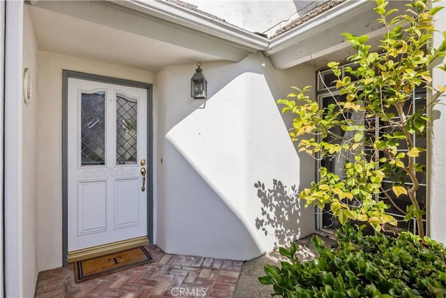 29282 Rue Cerise Unit 7, Laguna Niguel, CA 92677 - doorway to property with stucco siding