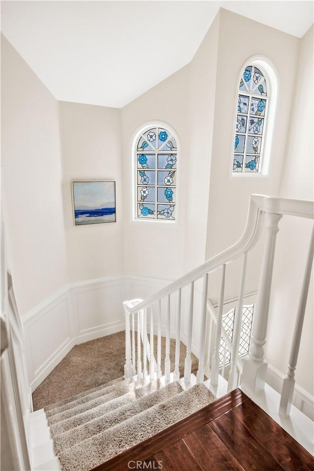 29282 Rue Cerise Unit 7, Laguna Niguel, CA 92677 - staircase featuring a wainscoted wall and a decorative wall