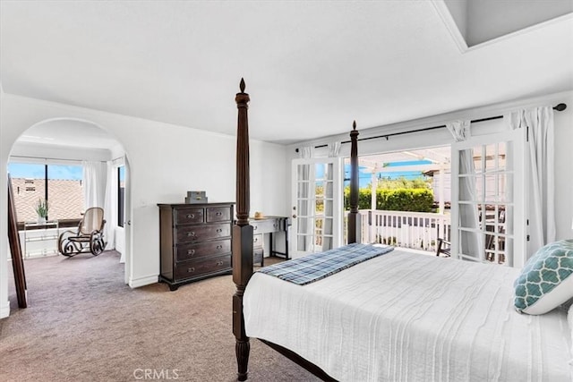 210 W Avenida Gaviota, San Clemente, CA 92672 - bedroom with access to outside, carpet floors, and arched walkways