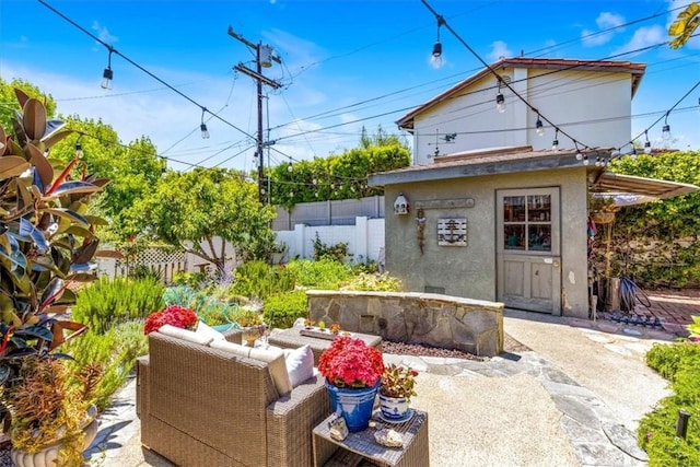210 W Avenida Gaviota, San Clemente, CA 92672 - fenced backyard with a patio area, outdoor lounge area, and an outdoor structure