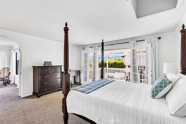 210 W Avenida Gaviota, San Clemente, CA 92672 - bedroom featuring carpet flooring, multiple windows, access to exterior, and arched walkways