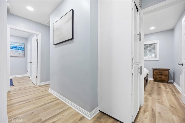 107 E Johnson St, Compton, CA 90220 - corridor featuring light wood-style flooring and recessed lighting