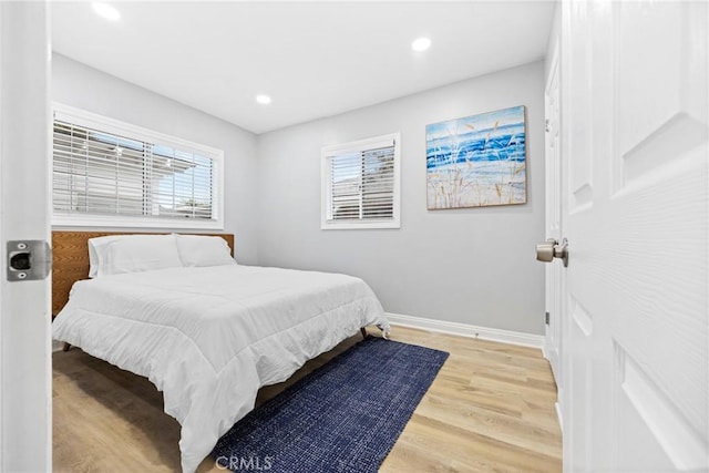 107 E Johnson St, Compton, CA 90220 - bedroom with light wood-style floors and recessed lighting