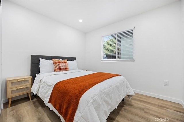 107 E Johnson St, Compton, CA 90220 - bedroom with wood finished floors and recessed lighting