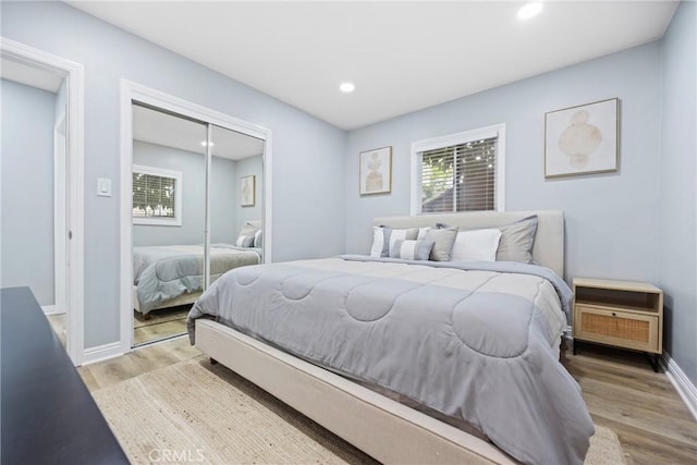 107 E Johnson St, Compton, CA 90220 - bedroom with light wood finished floors, recessed lighting, and a closet