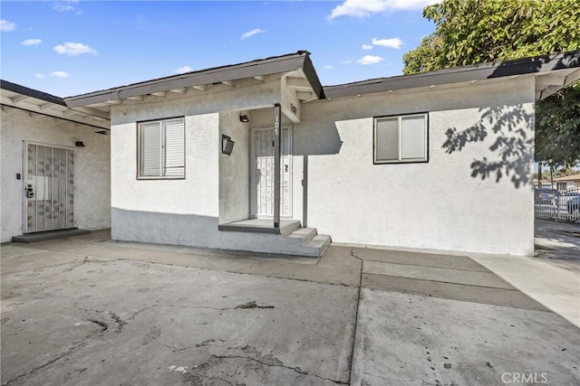 107 E Johnson St, Compton, CA 90220 - property entrance featuring stucco siding