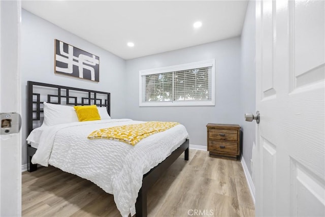 107 E Johnson St, Compton, CA 90220 - bedroom with wood finished floors and recessed lighting