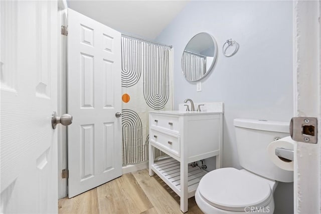 107 E Johnson St, Compton, CA 90220 - full bathroom with vanity and wood finished floors