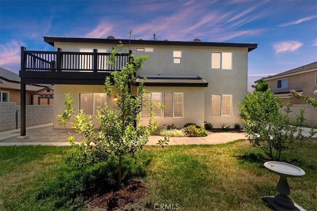 6701 Whitewater St, Eastvale, CA 91752 - back of house featuring stucco siding, a patio area, and a deck