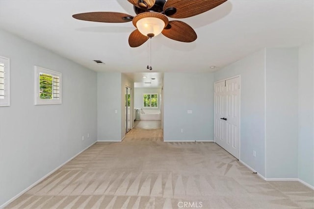 6701 Whitewater St, Eastvale, CA 91752 - spare room with light colored carpet and a ceiling fan