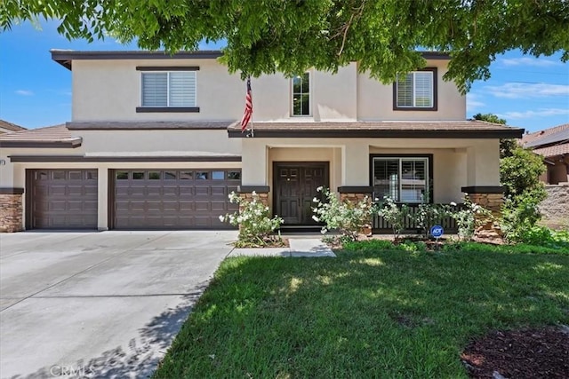 6701 Whitewater St, Eastvale, CA 91752 - view of front of home featuring driveway, a front lawn, an attached garage, and stucco siding
