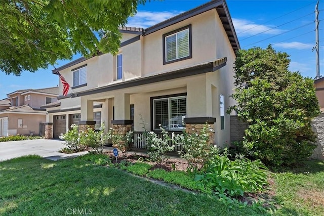 6701 Whitewater St, Eastvale, CA 91752 - traditional-style house with a porch, stucco siding, concrete driveway, and a front yard
