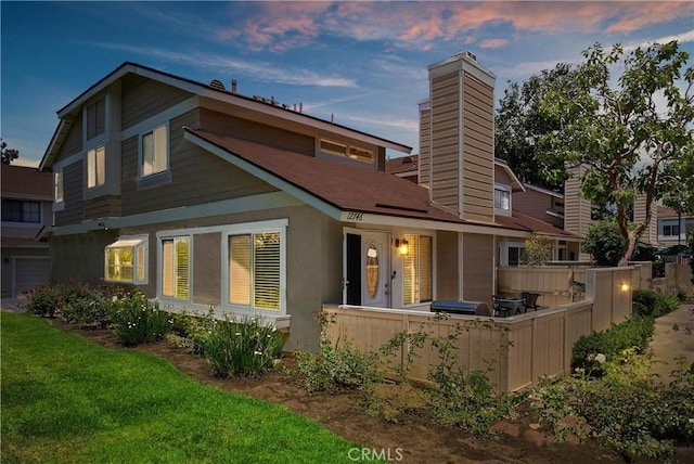 12746 Rosebrook Way, Stanton, CA 90680 - rear view of house with a chimney