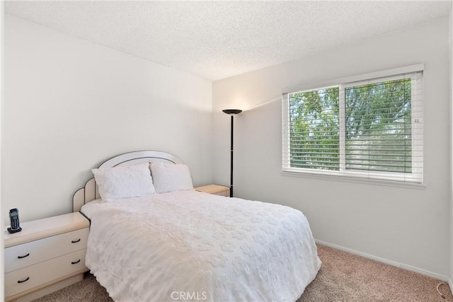 12746 Rosebrook Way, Stanton, CA 90680 - carpeted bedroom with a textured ceiling and baseboards