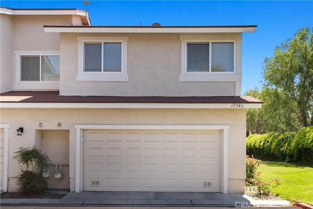 12746 Rosebrook Way, Stanton, CA 90680 - view of front of home featuring a garage and stucco siding