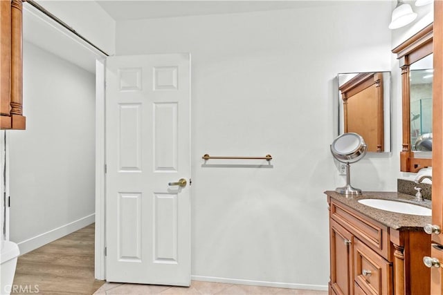 456 E San Jose Ave Unit C, Burbank, CA 91501 - bathroom featuring vanity and wood finished floors