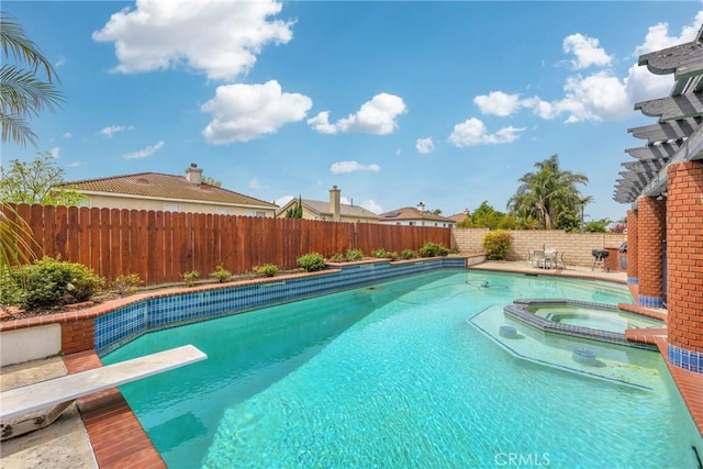 870 E Bermuda Dunes Ct, Ontario, CA 91761 - view of swimming pool featuring a fenced backyard, a pool with connected hot tub, and a diving board