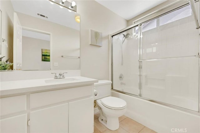 870 E Bermuda Dunes Ct, Ontario, CA 91761 - bathroom featuring vanity, shower / bath combination with glass door, and tile patterned flooring