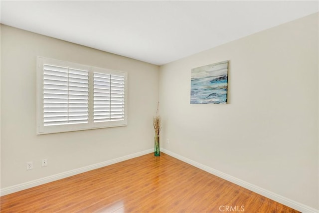 870 E Bermuda Dunes Ct, Ontario, CA 91761 - unfurnished room featuring wood finished floors and baseboards