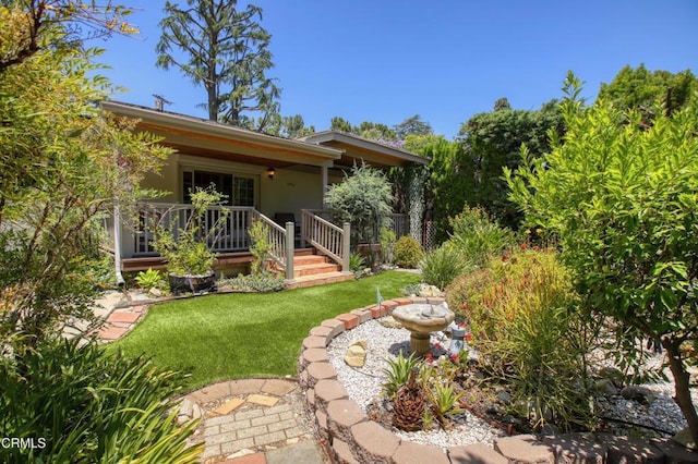 3628 El Caminito Ln, Crescenta, CA 91214 - back of house featuring a lawn, covered porch, and stucco siding