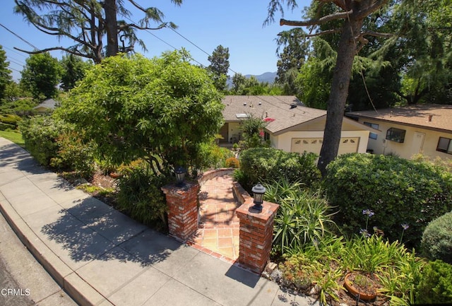3628 El Caminito Ln, Crescenta, CA 91214 - view of front of house with an attached garage and a mountain view